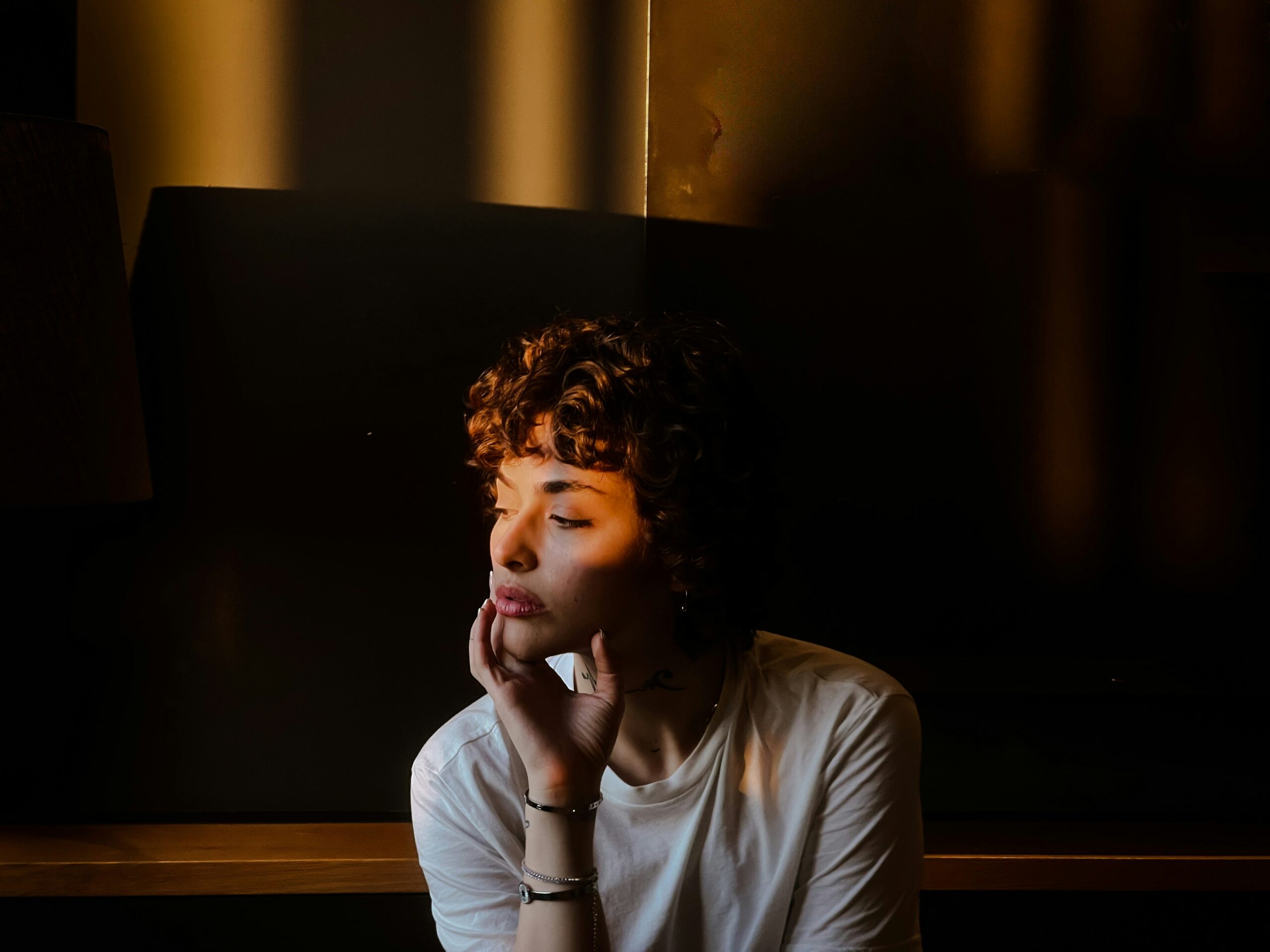 A woman in a quiet moment of reflection